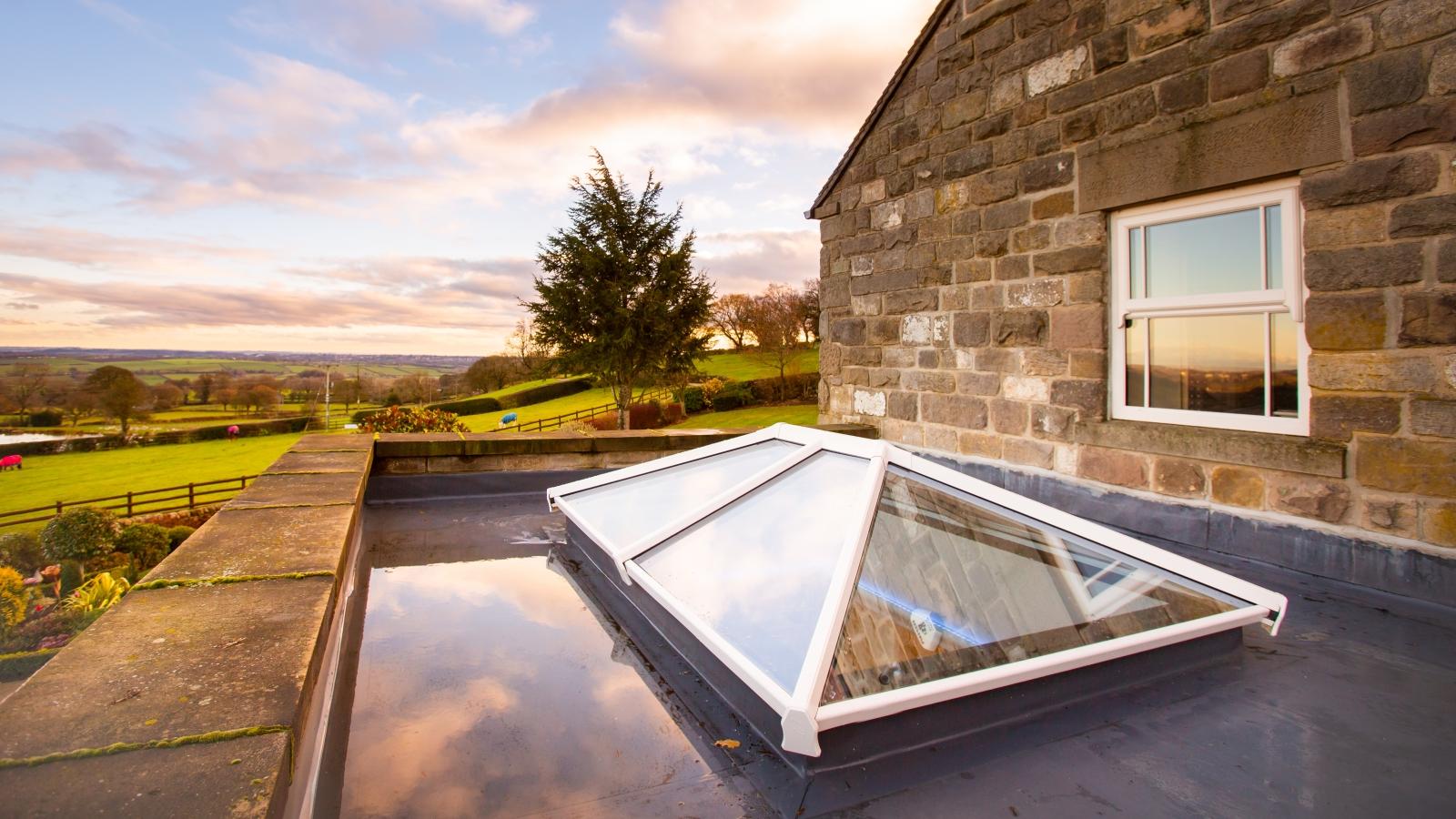External view of white Elevate lantern roof on an extension 