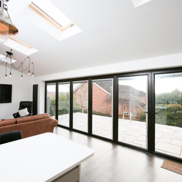 Black brown Alumina bi-fold doors 