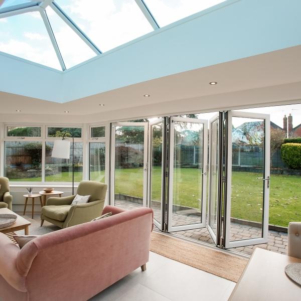 home extension with lantern roof and open bi-fold doors