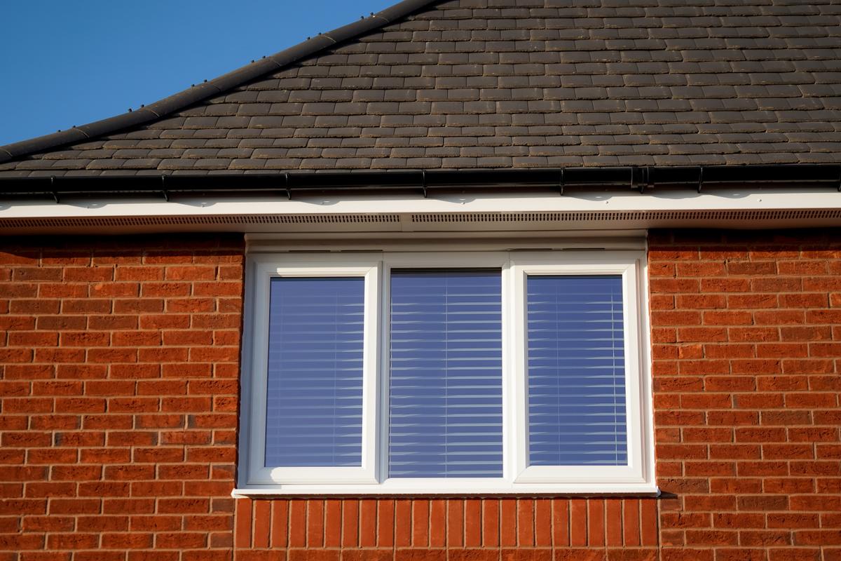 Close up of Liniar 70mm EnergyPlus casement window on a redbrick home