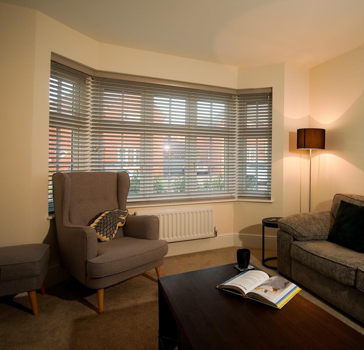 Living room featuring Liniar 70mm bay window interior shot