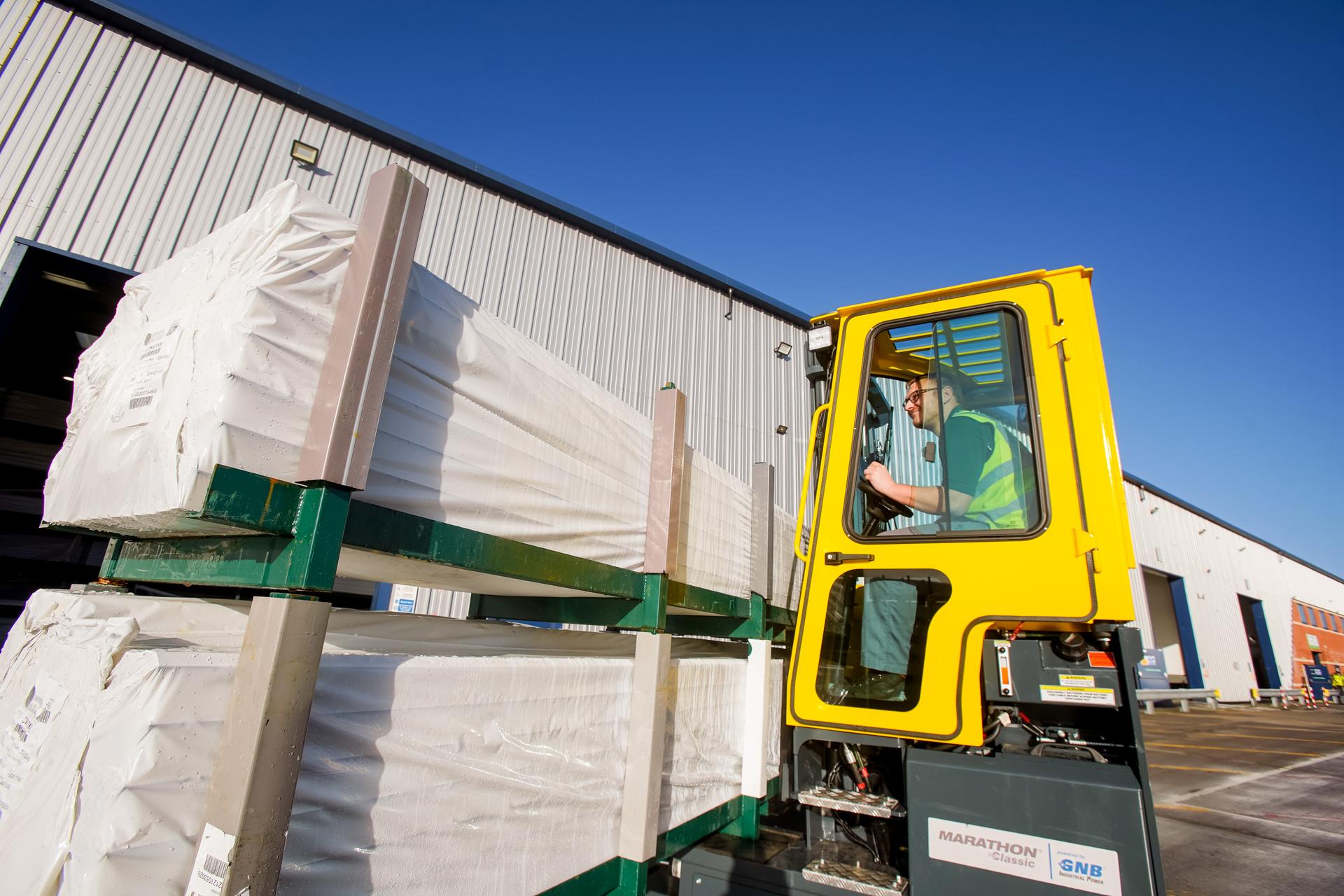 Combi truck outside warehouse