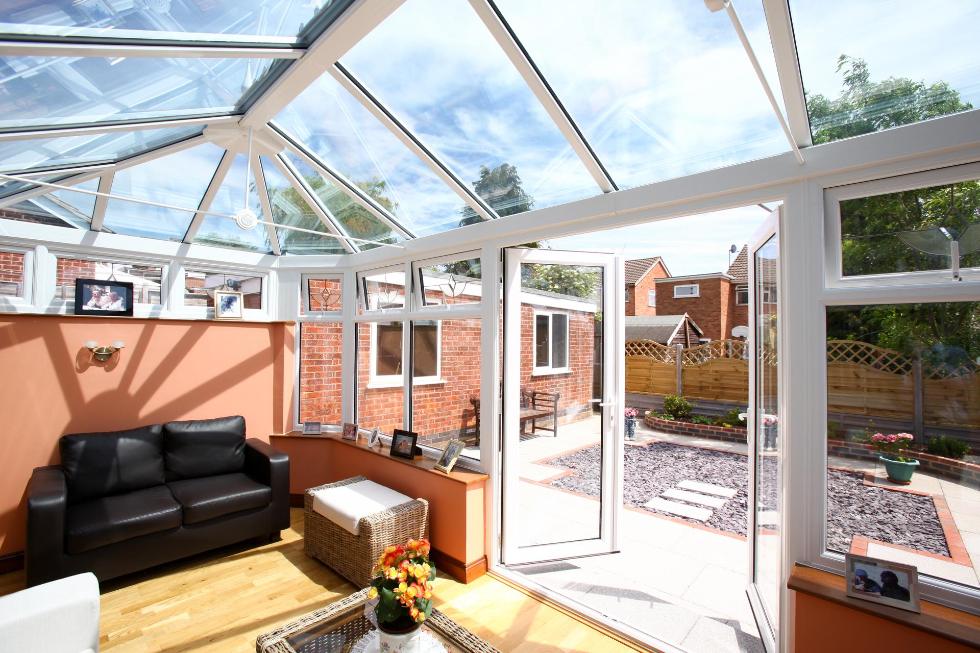 Liniar double hipped conservatory style in white