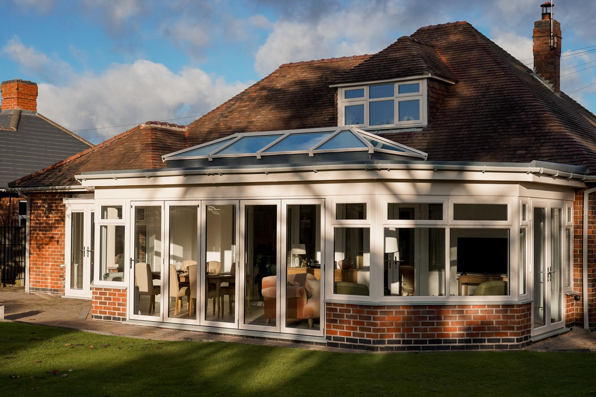 Bungalow conservatory with Elevate lantern roof, EnergyPlus 70mm Bi-fold door